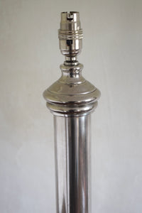 two large silver lamps