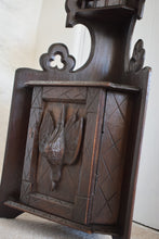 Load image into Gallery viewer, Small Oak Corner Cupboard with Carved Bird Panel Detail