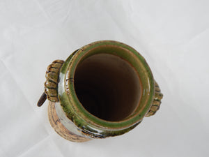 large green vase with handles
