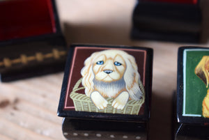 Seven Miniature Russian Lacquer Trinket Boxes Decorated with Dogs