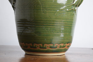 green pottery bread bin