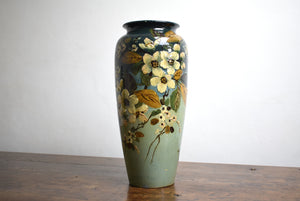 tall vase with flower decoration