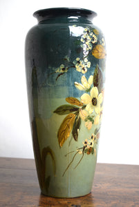 tall vase with flower decoration