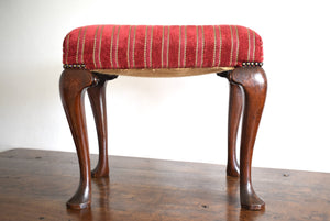 Red upholstered Footstool