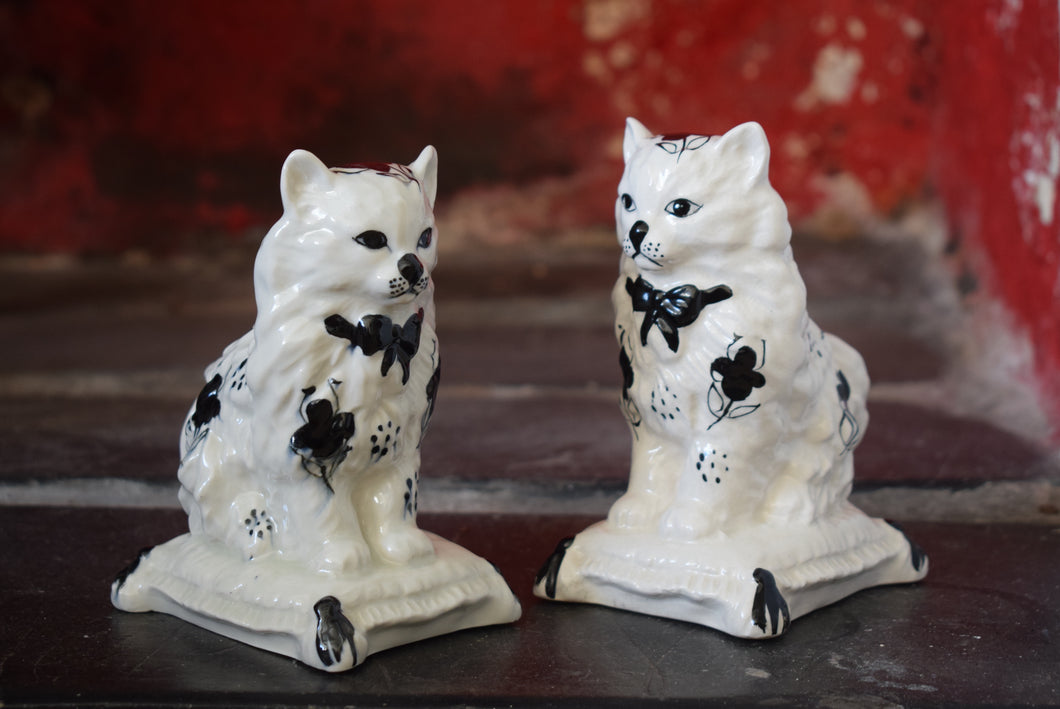 pair of ceramic cats