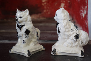pair of ceramic cats