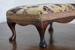 Stool with butterfly upholstery