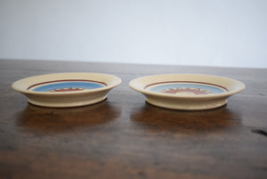 pair of blue pottery dishes