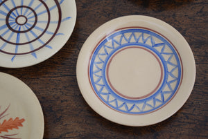 seven ceramic painted plates