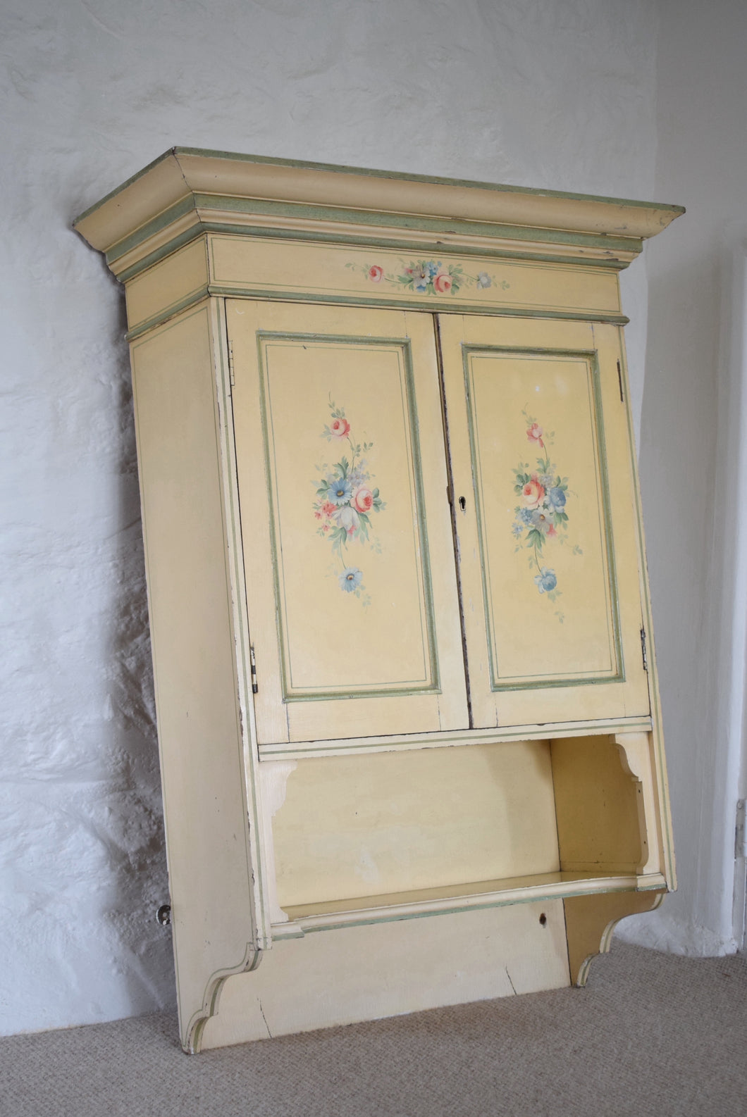 painted wooden wall cupboard