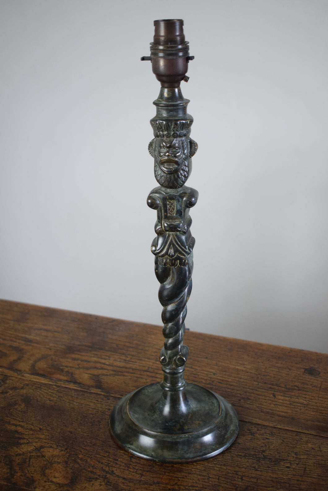bronze man table lamp