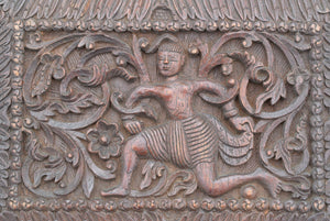 pair of carved wooden panels