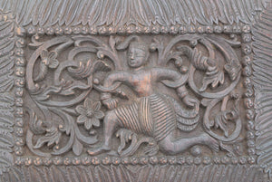 pair of carved wooden panels