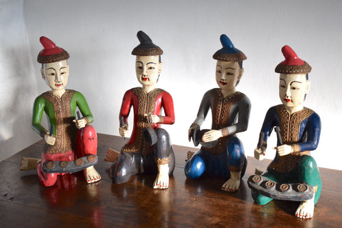 Carved wooden musician figures