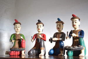 Carved wooden musician figures
